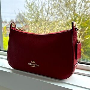 Coach purse! Never used with tags! Can be used as clutch or crossbody.